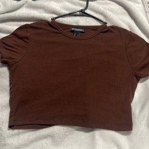 A brown loose crop top